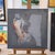 This artwork presents a striking depiction of a female body from behind, rendered with a minimalistic yet evocative style....