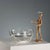 Glass bowl with spouts set in a tubular silver-plated metal frame with handles for table service. Brand name engraved...
