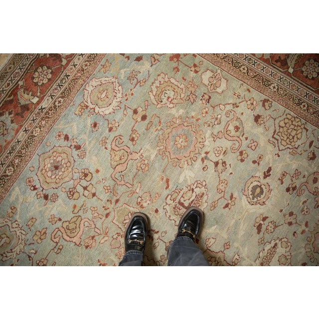 Allover covered field of roundel floral top views and serrated palmettes arranged in staggered rows and light lattice...