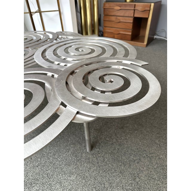 Large Contemporary Creation spiral stainless steel coffee cocktail low table by the italian designer artist Antonio...