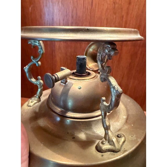 Antique brass coffee maker, or samovar cafetière, with turned wooden handle and spirit base with hinge cover. No lid. No...