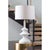Inspired by a paper maché sculpture, this versatile lamp is at home in a variety of spaces. Complex curves, paired with a...