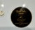 Lovely black and white Fornasetti plate rimmed in gold. Unused decorative plate. Made in Germany