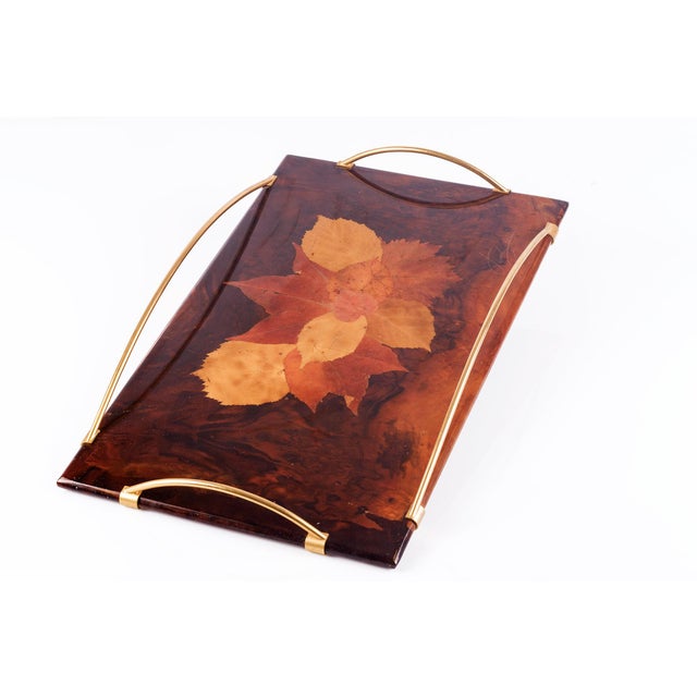 Splendid Art Deco serving tray, leaves under resin on burl wood and brass handles, France. Signed.