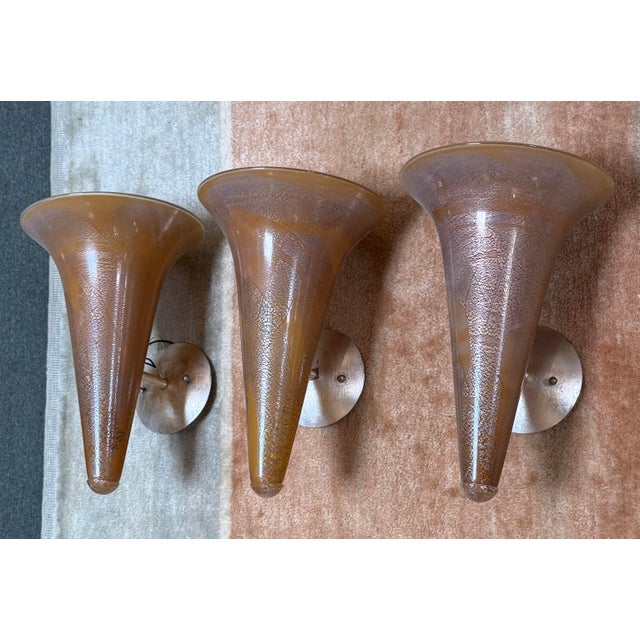 Design Plus Gallery presents a Set of Three Trumpet Wall Sconces from Bacchus Glass. These incredibly unique sconces have...