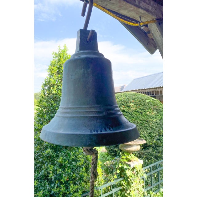 Great old bronze bell with clapper from France. This rather large bell has an ornate shape and has a fantastic patina that...