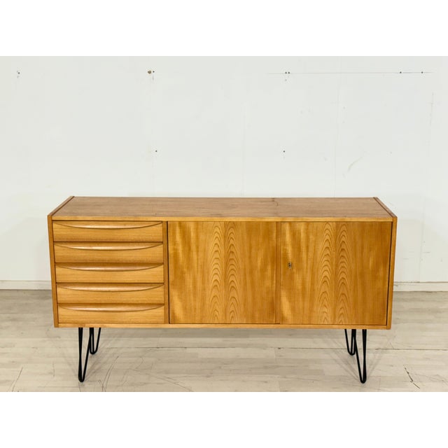 A beautiful vintage sideboard from the Hellerau workshops. The timeless design of the 602 series (designed by Franz...