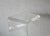 1980s clear Lucite acrylic pedestal stand, often used for displaying art or sculptures. Fabulous low-profile stand to...