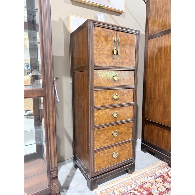 A beautifully figured Drexel Heritage lingerie chest that showcases the warmth and movement of burlwood veneers with...