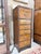A beautifully figured Drexel Heritage lingerie chest that showcases the warmth and movement of burlwood veneers with...