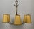 Large chandelier in brass with six arms, designed by Josef Frank in the 1950's, Austria. The silk shades in a yellow...