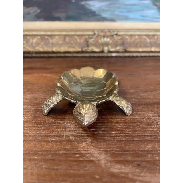 Charming vintage turtle-shaped dish featuring a detailed sculpted shell textured legs. The design captures a lifelike...