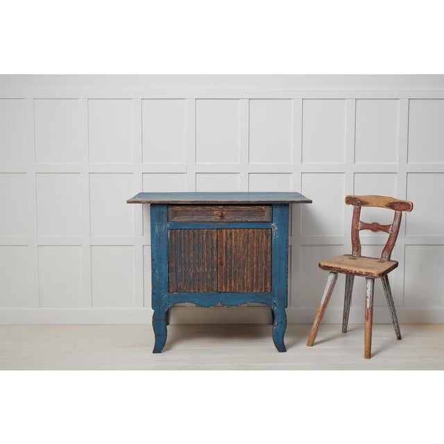 Antique Swedish small sideboard in folk art from an area called Hälsingland. Locally in Hälsingland this type of sideboard...