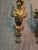 A rare vintage original pair of Italian mid century gilded pair of sconces. Having all hand made construction with an...