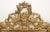 An exceptional and richly ornamented 18th-century Louis XVI carved giltwood mirror, distinguished by its magnificent...