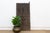 Attributed to the late 19th to early 20th century (circa 1890s–1920s), this authentic 71-inch architectural door is a...
