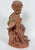 A well executed 18th Century terracotta sculpture of a young boy as the young Bacchus. The sculpture is hand formed and...