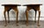 This is a gorgeous pair of vintage traditional Queen Anne style round side tables or lamp tables featuring warm walnut-...