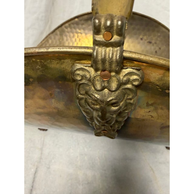 Add a touch of Regal warmth to your hearth with this striking vintage brass log holder. Crafted from substantial, heavily...