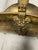 Add a touch of Regal warmth to your hearth with this striking vintage brass log holder. Crafted from substantial, heavily...