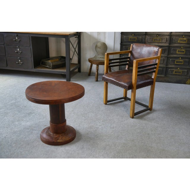 This armchair features an intriguing blend of materials and styles: a solid wood frame with angular lines, sturdy...