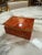 Rectangular vintage jewelry or trinket box crafted from richly colored red onyx stone, known for its deep crimson tones,...