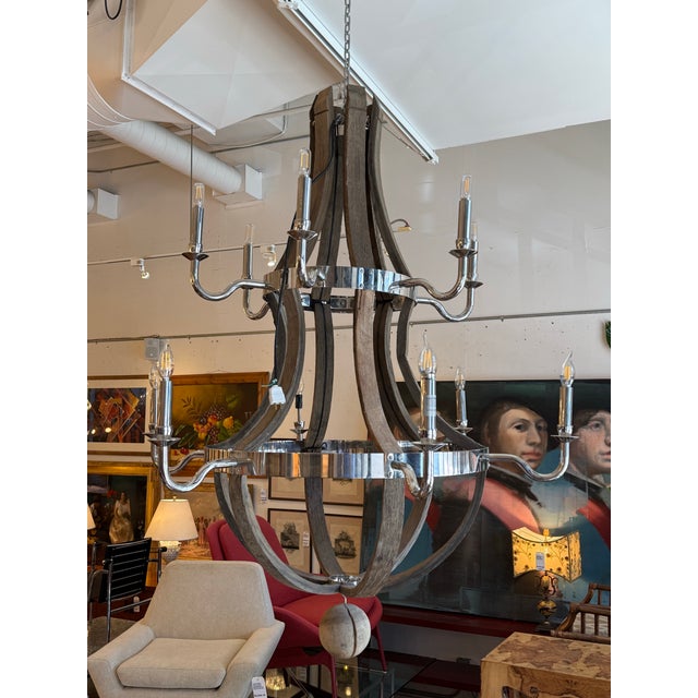 Design Plus Gallery presents the 12 Light Wine Barrel Chandelier from Restoration Hardware. Made by hand from reclaimed...