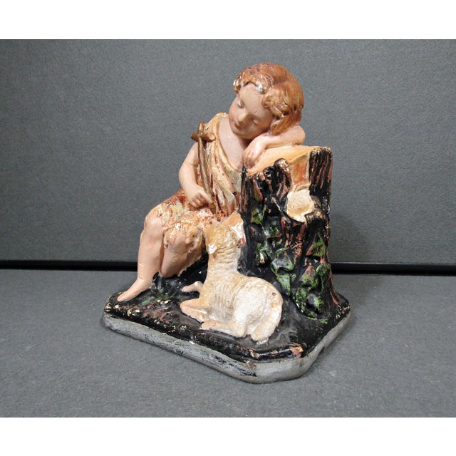 This antique/vintage chalkware sculpture depicts the young St. John the Baptist in a tender devotional composition with...