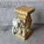Enhance your space with this intricately hand-painted ceramic elephant stool. Its white and gold Hollywood regency accents...