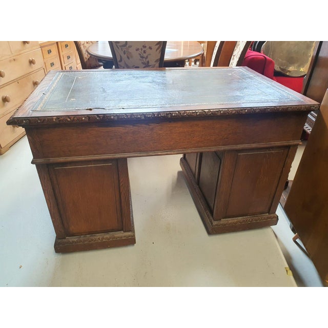 Antique Carved Oak Desk with Lion Handles, 1890s, in Very Good conditions. Designed 1890 to 1919