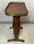 Charming small marquetry side table, typical of the refined style of early 20th-century French furniture. Its oval top,...