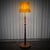 A refined Swedish Modern floor lamp from the 1940s, produced by Ivar Fransson, Industri IWO, Mariestad. This beautifully...