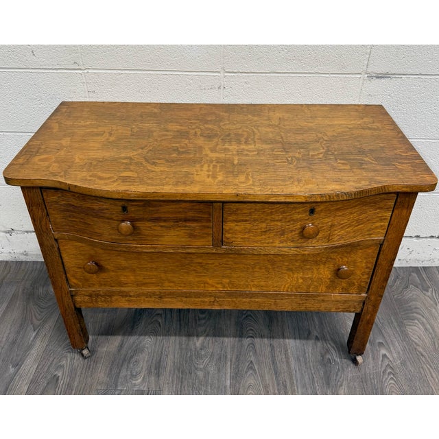 This is a beautiful antique Mission Arts and Crafts tiger oak quarter sawn oak server, bureau, sideboard, or buffet dating...