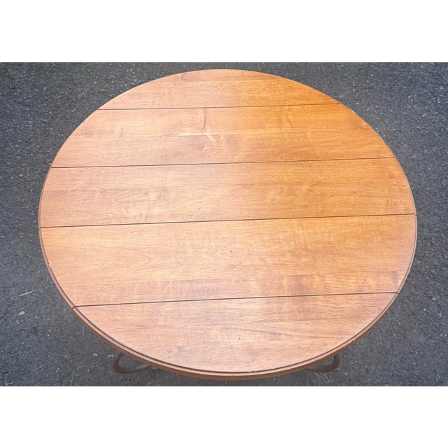 Very nice Ethan Allen iron and wood end table from the Legacy Collection. The beautiful maple top gives the appearance of...