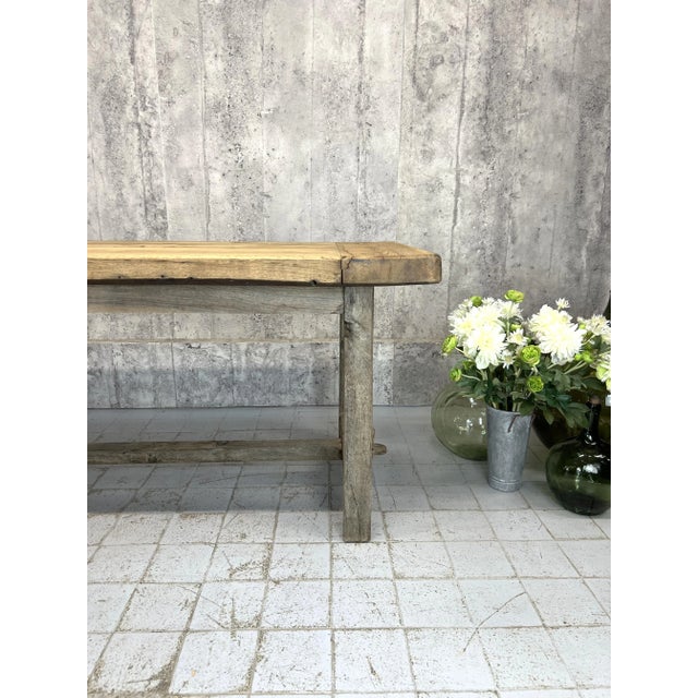 Dimensions: 248cm wide x 76cm deep x 77cm high. The distance between the legs along the longest side of the table is...