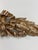 Vintage carved giltwood wall ornament featuring a sculptural central ribbon bow, flowing ribbon swags and symmetrical...