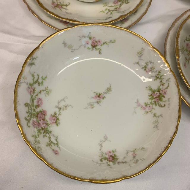 Offered here is an antique French Theodore Haviland porcelain tea setting with 16 pieces (service for 4 incline tea cup,...