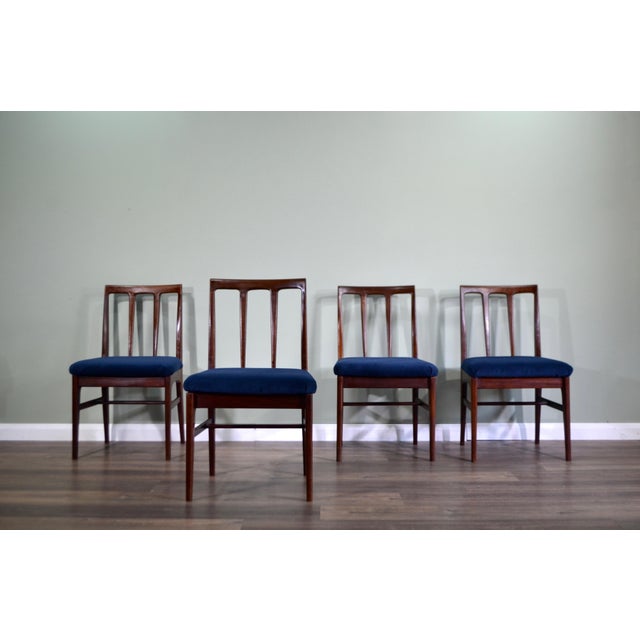 Stylish Set of 4 Vintage A. Younger afromosia Chairs for sale. A set of four beautifully designed & crafted solid...