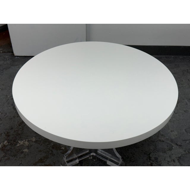 Design Plus Gallery presents a Bespoke Round White Caesarstone Table + Lucite Pedestal Base. This custom table pairs a...