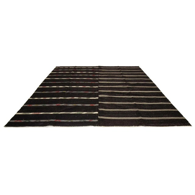 Large vintage handwoven kilim rug from Afyon region of Turkey. Approximately 50-60 years old. In very good condition