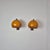 A pair of wall sconces by Szarvasi from the 1970s, designed in the distinctive Space Age aesthetic of the era. The amber...