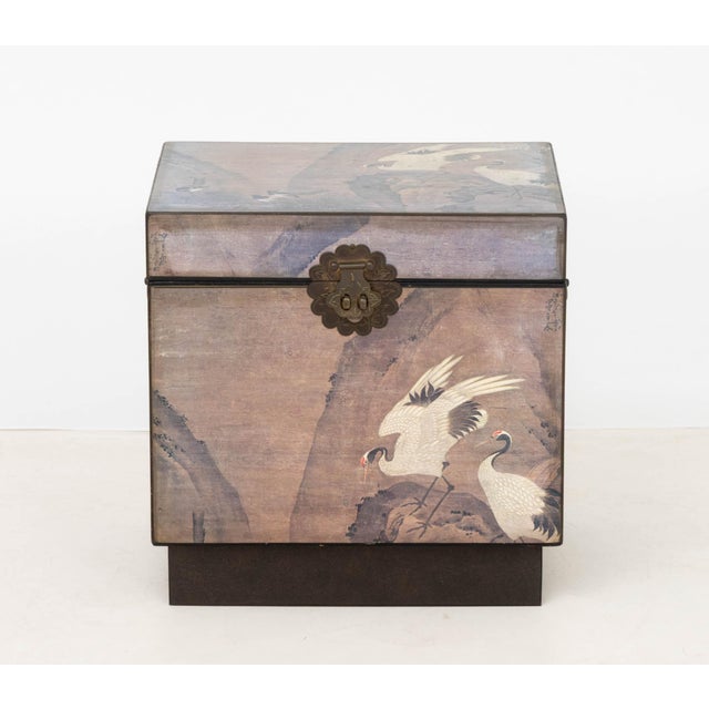 Chinese Crane and Bird Motif Chest, with brass hardware, the exterior printed with scenes of red-crowned cranes and...