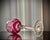 A set of six vintage hock wine glasses in ruby cut-to-clear crystal. the rounded bowls feature alternating radiating...