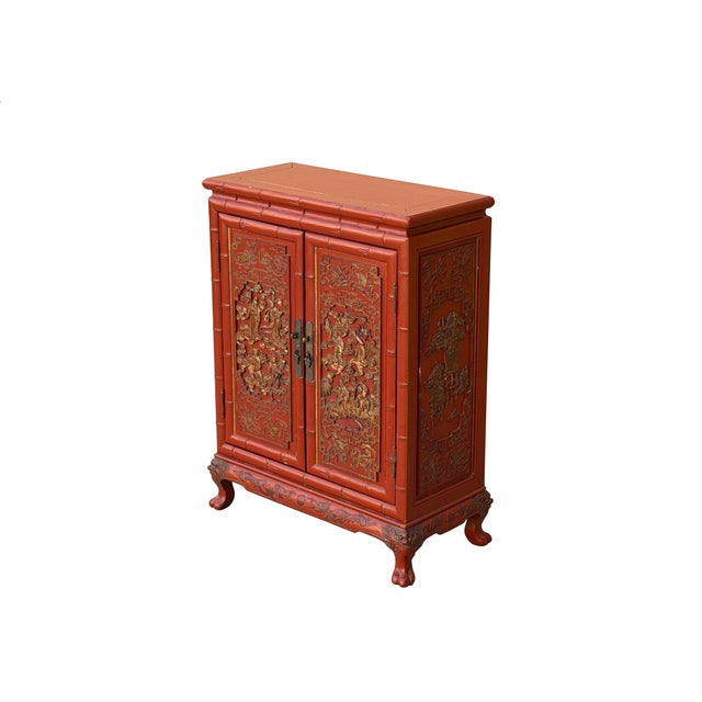 This exquisite Chinese-style vermilion lacquer paint cabinet features a striking faux-bamboo frame that lends a rhythmic,...