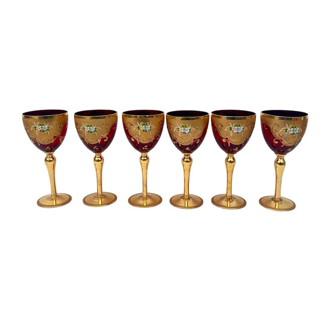 The Murano Glass E. Vianello Signed & Painted 24KT Ruby Decanter set includes 6 wine glasses and 5 brandy glasses, all...