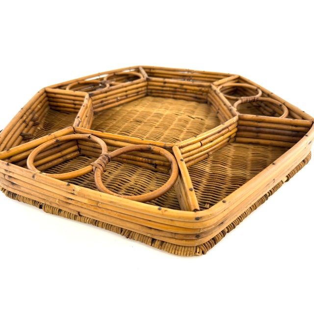 This mid-century rattan tray is both practical and stylish, featuring a hexagonal shape that adds a unique geometric...