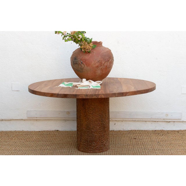 A grand-scale centerpiece, this 60-inch dining table is crafted from solid planks of reclaimed Burma Teak. The historical...