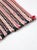 This is a vintage farmhouse rag rug. The small striped accent rug features fringed ends and a rose red, pink, gray, black...