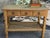 A beautiful and highly functional Danish oak table attributed to Henning Kjærnulf, featuring the designer’s signature...