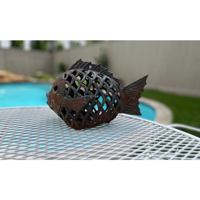 Mid century vintage cast iron fish lantern. This lantern is whimsical and summer fun patio decor. Bottom insert has space...